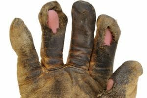Dirty Leather Work Glove With Holes